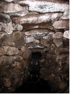 View through the tunnel of Upton Chamber, showing the large roof slabs.